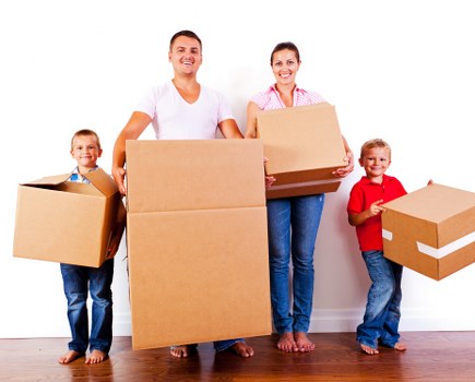 Secure storage facility with moving trucks