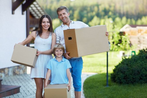 Happy family organizing their belongings in a storage unit